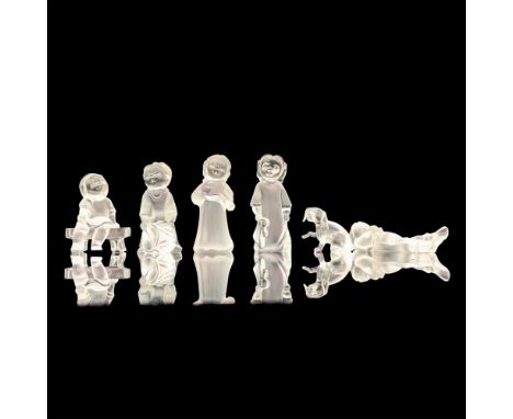 A set of 6 frosted crystal figures that depict characters from Julia's World and one figure is a clear crystal bench. The 6-c