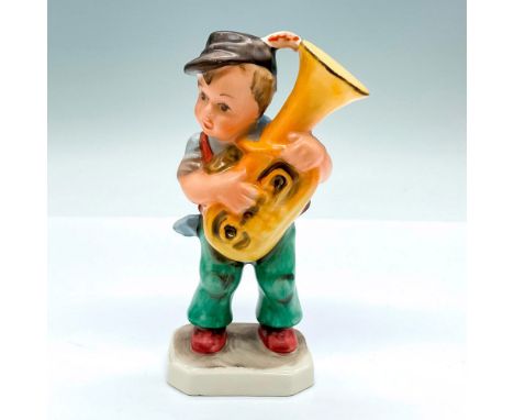 Hand painted and hand decorated figure of a musician playing the tuba. Friedel Bavaria backstamp. Issued: 20th centuryDimensi
