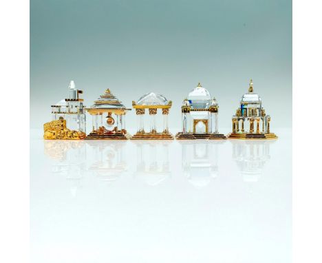 Figures decorated with gold metal that depict historical buildings. The five figures are, a Gold Castle, a Cathedral, a Japan