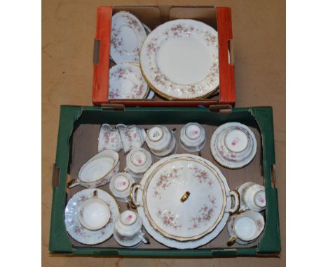 A Royal Albert / Paragon Victoria Rose dinner service including tureen, plates, cups and saucers etc. Approx 70 pieces.