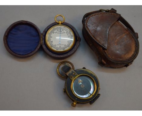 A WW1 military issue compass by H. Hughes & Son Ltd No. 10745 in leather case together with a cased pocket barometer. 