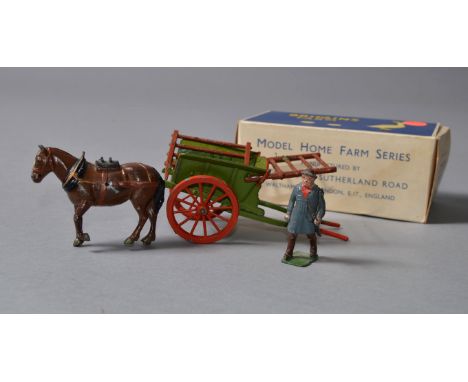 A boxed Britains diecast model 4F Tumbrel Cart from their Model Home Farm series.