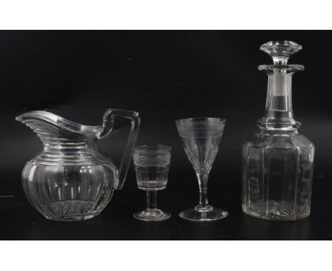 A Victorian mallet-shape decanter, octagonal stopper, 25cm; a Regency jug and two cut glass wine glasses.