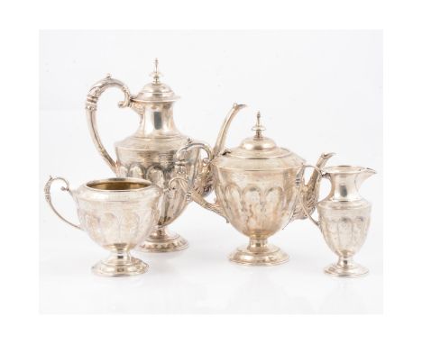 Victorian four piece silver tea service, W W Harrison &amp; Co, Sheffield, 1882, ivory insulators, gross weight 68.6oz.