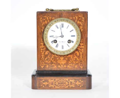 19th Century French rosewood and marquetry mantel clock, rectangular case on a moulded plinth, circular enamelled dial with R