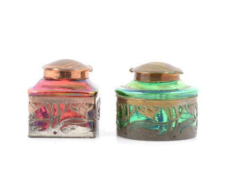 Two iridescent glass and metal mounted inkwells, Loetz, early 20th century, Art Nouveau style, one with a cylindrical body, g