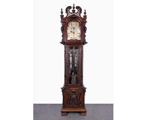 A fine Edwardian mahogany longcase clock, case with three urn finials, pierced and carved broken swan-neck pediment, hood wit