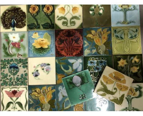 A quantity of Victorian and Edwardian decorative tiles, including a Henry Richards Peacock tile, Pilkington floral tiles desi