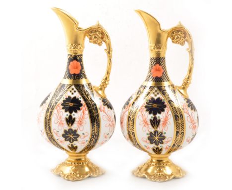 Pair of Royal Crown Derby flask-shape ewers, Old Imari pattern, 26cm.