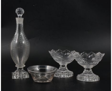 A pair of Regency cut glass pedestal salts, navette shape bowls with gardroon-like band, oval bases, width 9cm; a diamond rib