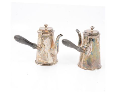 Pair of silver coffee pots, by Harrison Brothers &amp; Howson, Sheffield 1901, each with hardwood handle, engraved crest, 12.