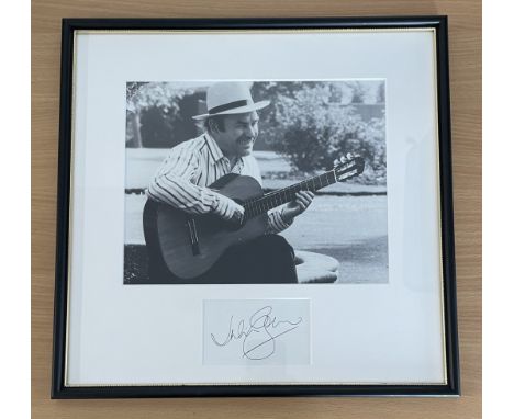 Julian Bream 15x14 overall approx. mounted and framed signature piece includes signed album page and vintage black and white 