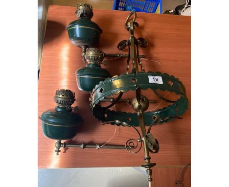 A brass and painted brass pendant three branch oil lamp, 74cms high max. **Lots must be paid for and collected within seven w
