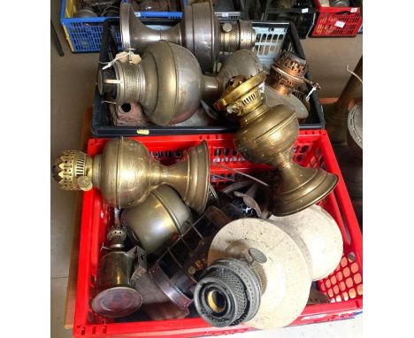 A quantity of oil lamp bases, mainly brass **Lots must be paid for and collected within seven working days of the sale; if th