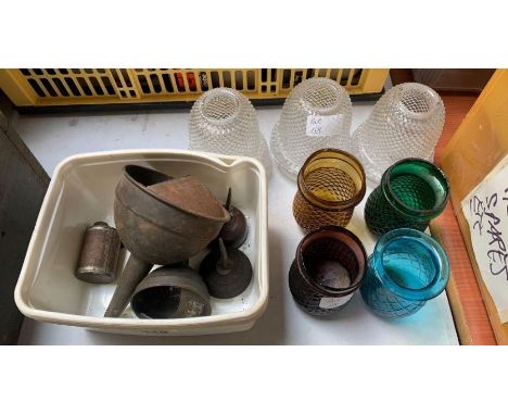 Four moulded coloured glass tea light holders; three clear moulded glass night lights; two small oil cans, funnels, etc **Lot
