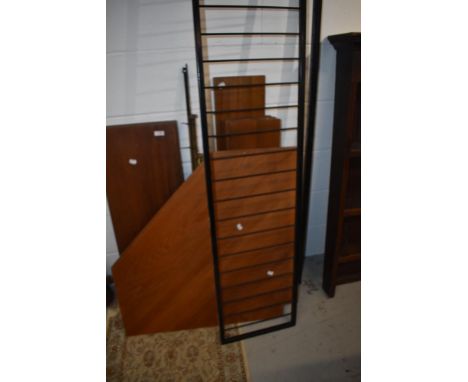 A selection of vintage teak ladderax parts
