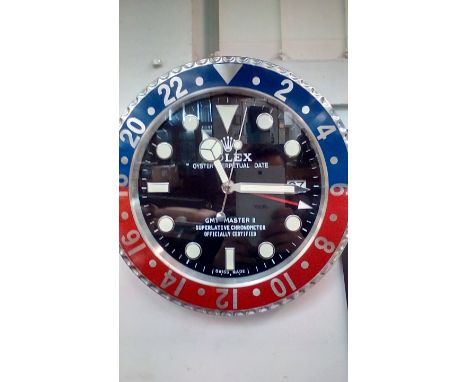 Rolex Oyster perpetual date GMT/Master II Superlative Chronometer. Rolex dealers wall clock