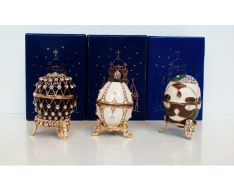 3x History of Fabergé Egg trinkets. With boxes some with COA