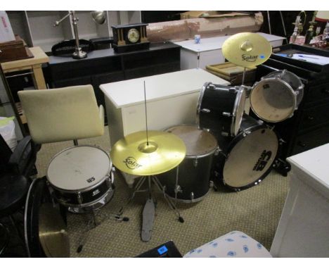 A CB drum kit with Sabian solar cymbals and a stool