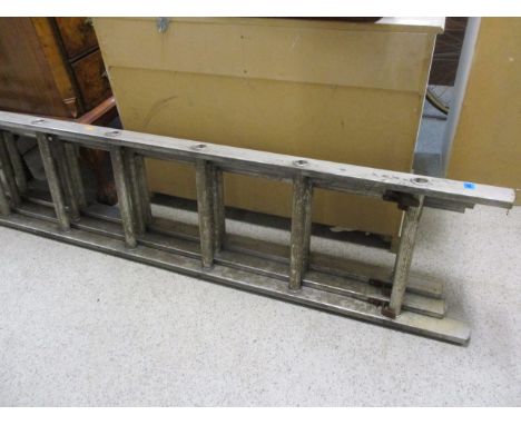 A three section aluminium ladder