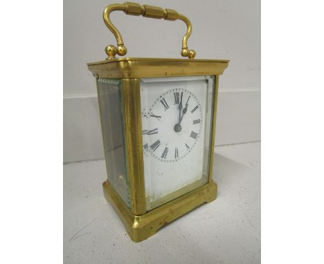 A 20th century brass five-window French carriage clock (with key), 5 1/2 h including handle