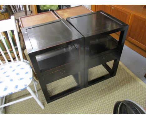 A pair of modern black painted bedside tables with a shelf and a drawer, 28h x 18w