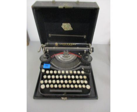 An Underwood manual typewriter in a lockable carrying case