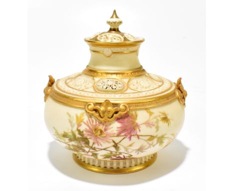 ROYAL WORCESTER; a blush ivory and gilt heightened potpourri with floral decoration, printed puce mark and numbered 1214, ret