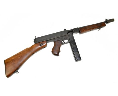 A deactivated Thompson sub-machine gun, US model 1928, A1, with a .45 stick magazine, overall length 86cm, SN:476903, deactiv