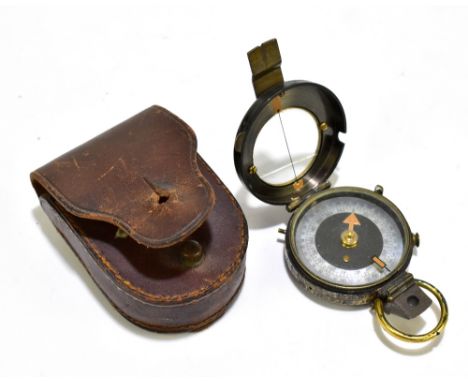 A leather cased military compass, unmarked, glass (af).Additional InformationGlass cracked, general heavy wear, a single lett