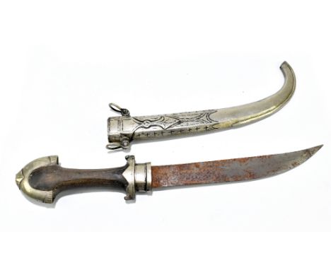 A North African/Middle Eastern jambiya with stylised detailed to metal mounts and scabbard, length 38cm.Additional Informatio