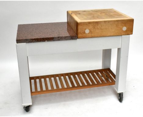 STEPHEN NEALL OF HARROGATE; a butcher's block on painted stand, the square section block sitting beside a granite worktop, bo
