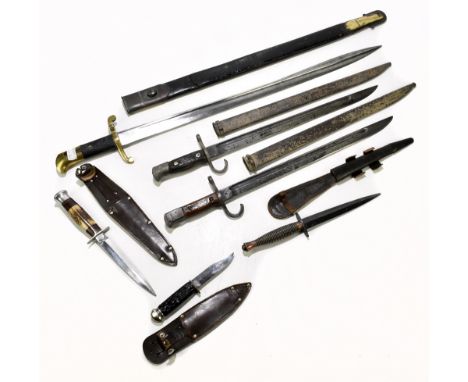 A commando type dagger with double edged blade, tip lacking, with leather scabbard, together with a William Rodgers horn hand