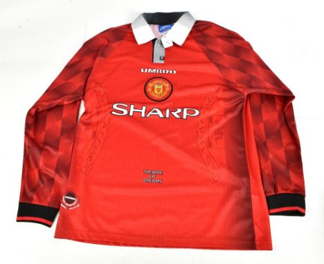 ERIC CANTONA; an Umbro Manchester United 1994-96 seasons retro reproduction home shirt signed with ‘Cantona 7’ to reverse, si