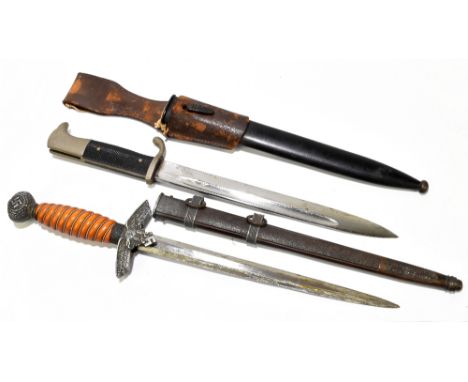 A German Third Reich Luftwaffe dagger, the 25cm blade marked for Puma Solingen, with scabbard, together with a bayonet with l