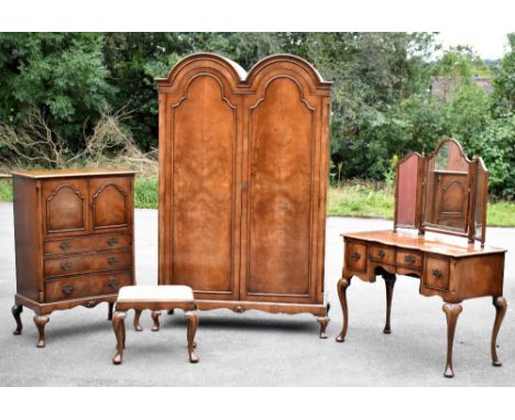 WARING &amp; GILLOWS; a three-piece walnut bedroom suite comprising crossbanded dressing chest with folding mirror of shaped 