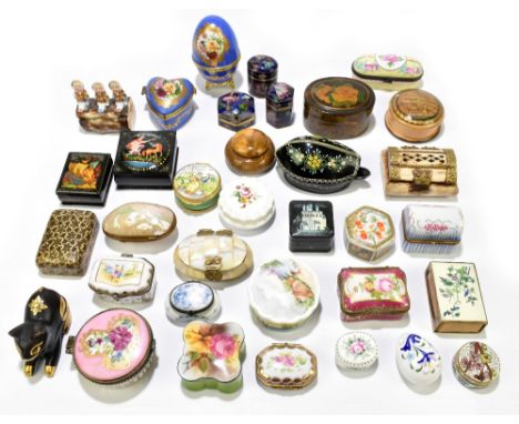 An assortment of enamel, porcelain, treen and other trinket and novelty boxes, including two Russian lacquered papier-mâché b