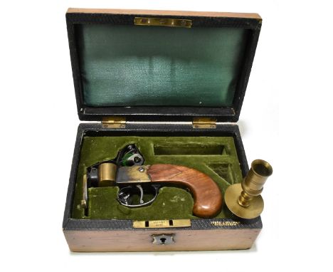 JESSE J. GILLHAM OF CHELTENHAM; a cased tinder lighter with walnut stock and brass taperstick.Additional InformationNot teste