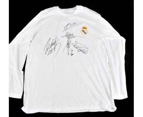 REAL MADRID LEGENDS; a retro-style cotton home shirt signed by Figo, Zidane, R. Carlos, Ronaldo and Raul, no stated size.Addi