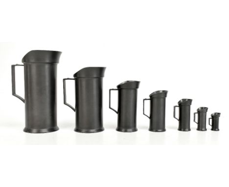 A graduated set of seven Continental pewter measures, from 1l down to 1cl, height of tallest 19.5cm (7).Additional Informatio