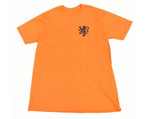 JOHAN CRUYFF; a Netherlands retro-style cotton home shirt signed with no. 14 to reverse, no stated size. Additional Informati