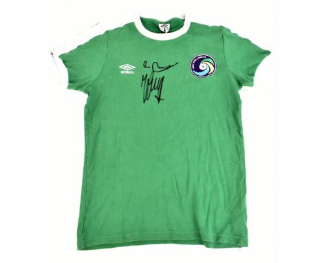 NEW YORK COSMOS LEGENDS; an Umbro retro reproduction cotton shirt signed by Beckenbauer and Cruyff, size S. Additional Inform