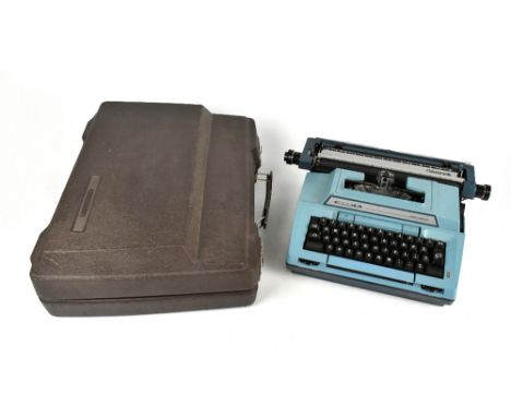 A Smith-Corona Coronet XL 'Coronamatic' typewriter in blue, cased.