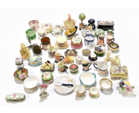 A collection of small enamel boxes and toy sized ceramics including a limited edition enamel box decorated with a scene after
