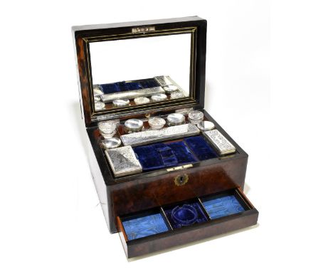 A 19th century burr walnut dressing/vanity box with inset mirror to lid interior and fitted sections housing clear glass vani