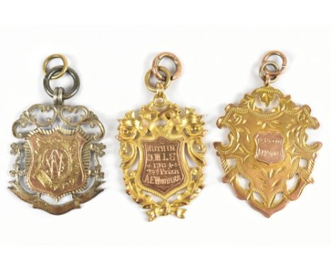 Two Edwardian 9ct gold sporting medals to A.E. Woodier, one engraved 1904, second prize', the other engraved 'First prize A.E