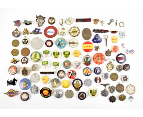 A group of vintage badges with automobile interest, including BP Super, Shell Tractor Lubrication, with further Squires Gate 