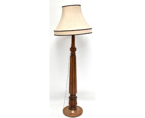 A late 19th century mahogany standard lamp with fluted column, height 156cm.