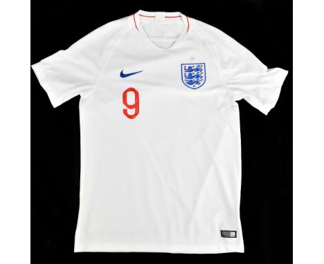 HARRY KANE; a Nike England home shirt signed with ‘Kane 9’ to reverse, size M. Additional InformationCreasing and light gener