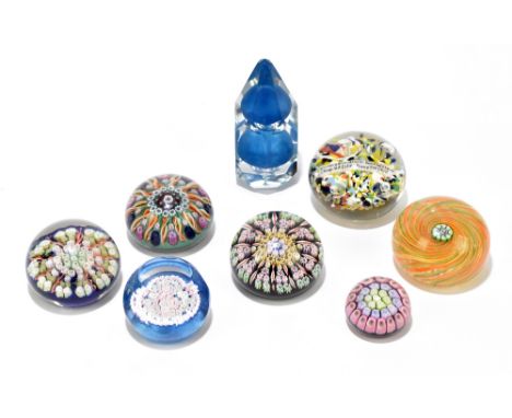 A collection of eight assorted paperweights including Strathearn examples, a Scottish example, possibly Strathearn, of a cent